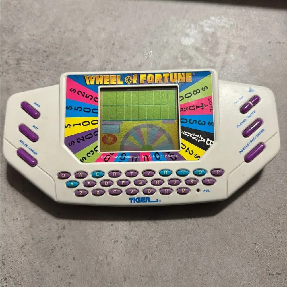 Vintage Tiger 1995 Wheel of Fortune Handheld Game - works great!